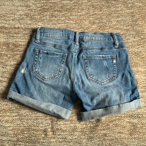 Distressed denim shorts
